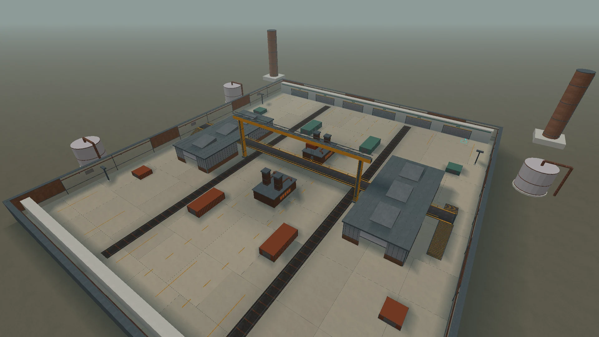 Later Ironworks overhead view with gray corrugated roofs, a yellow crane, industrial tanks and smokestacks.