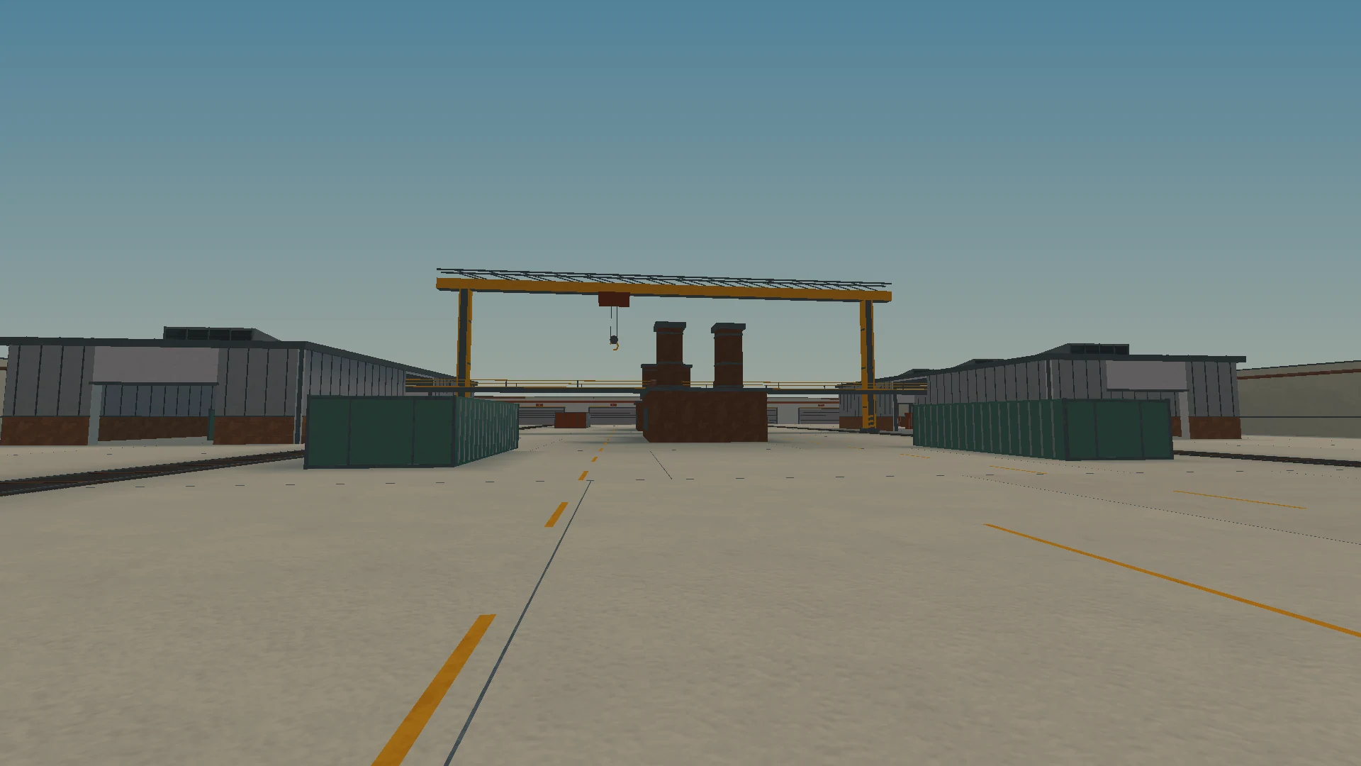 Same Ironworks approach after the quality pass, with concrete paving, lane paint and corrugated warehouses.